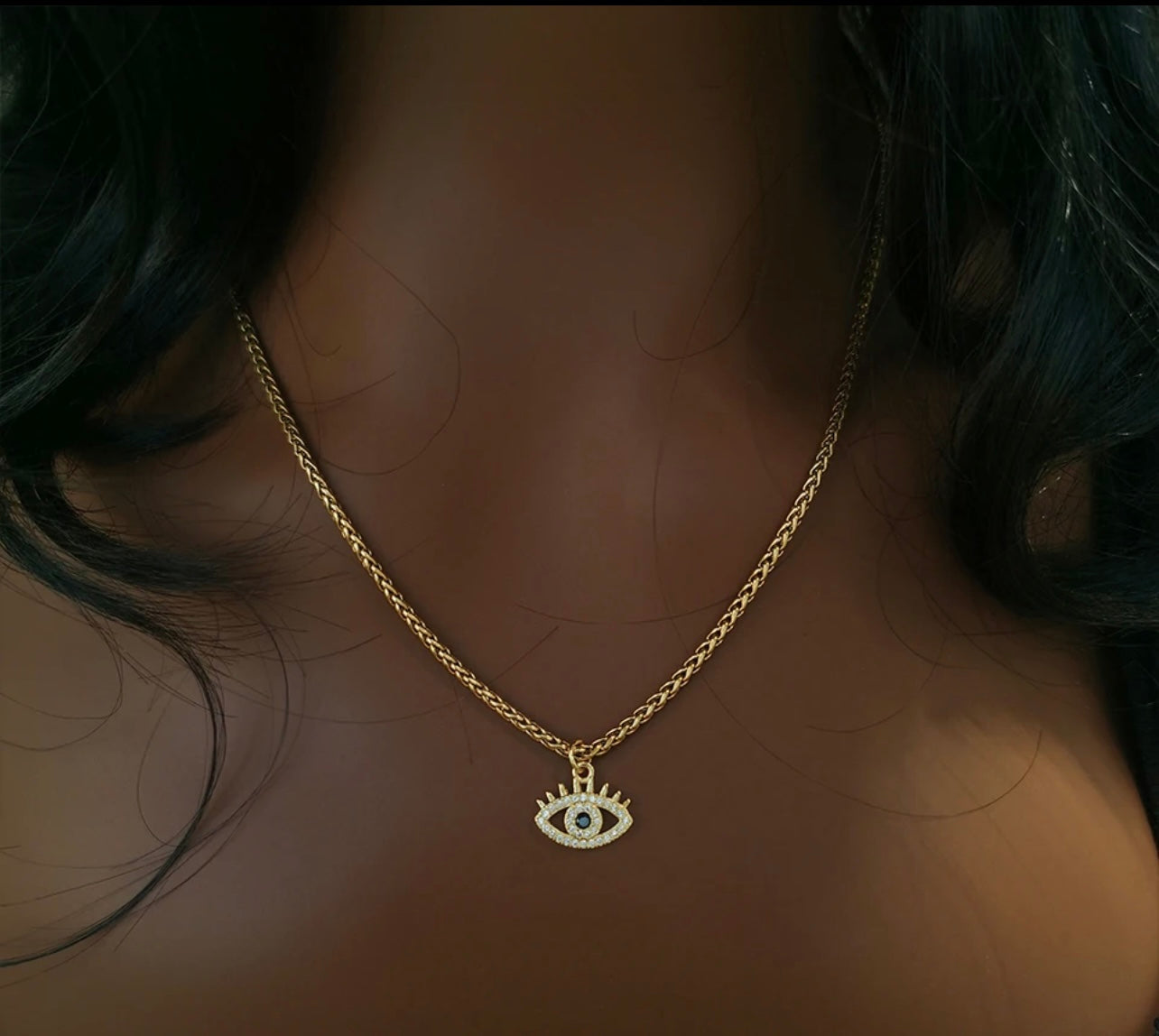Evil eye pendant gold rope chain necklace