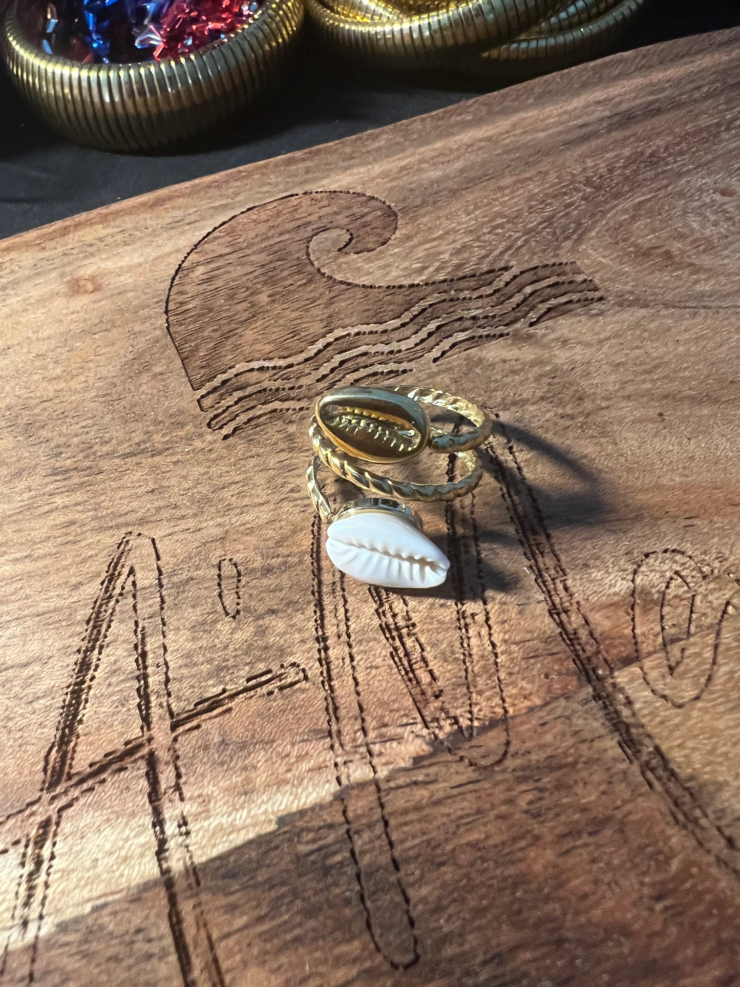 Shell wrapped in gold ring