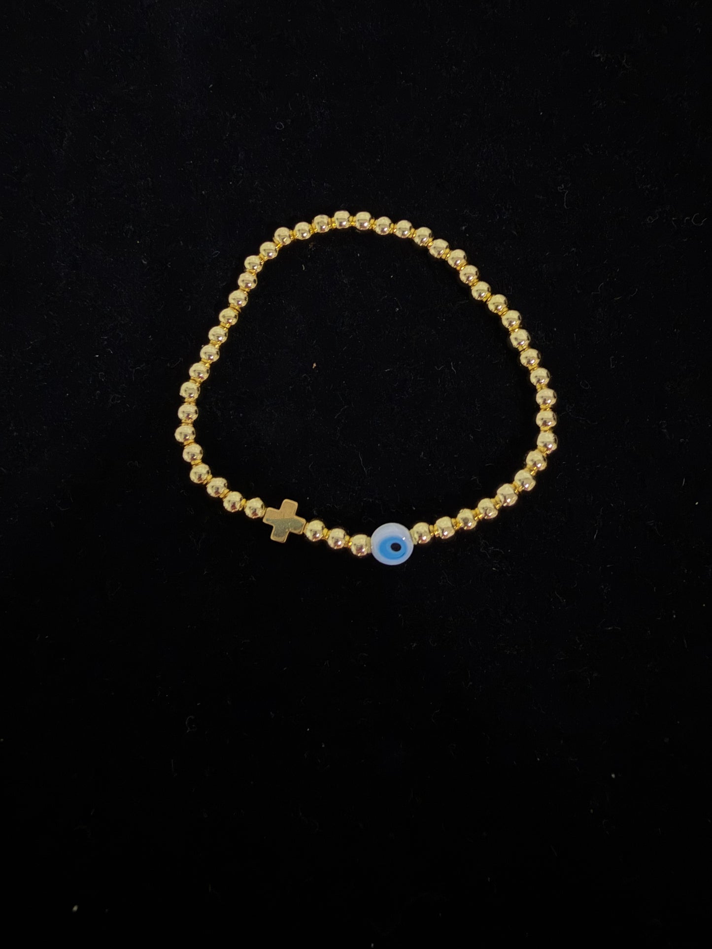 White eye or blue and cross gold plated beaded bracelet