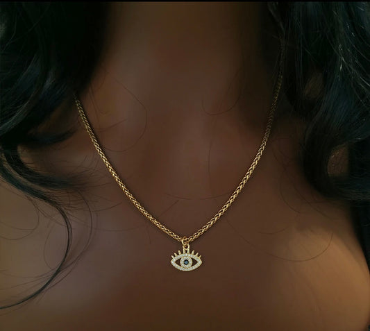 Evil eye pendant gold rope chain necklace