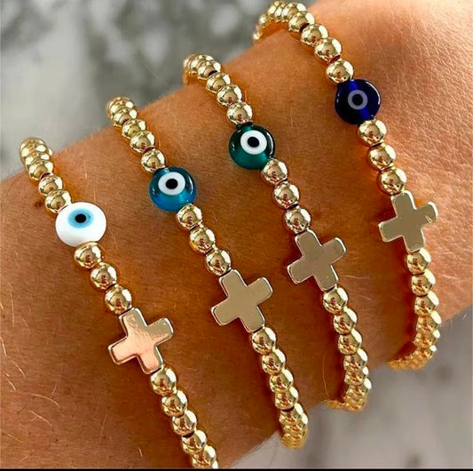 White eye or blue and cross gold plated beaded bracelet
