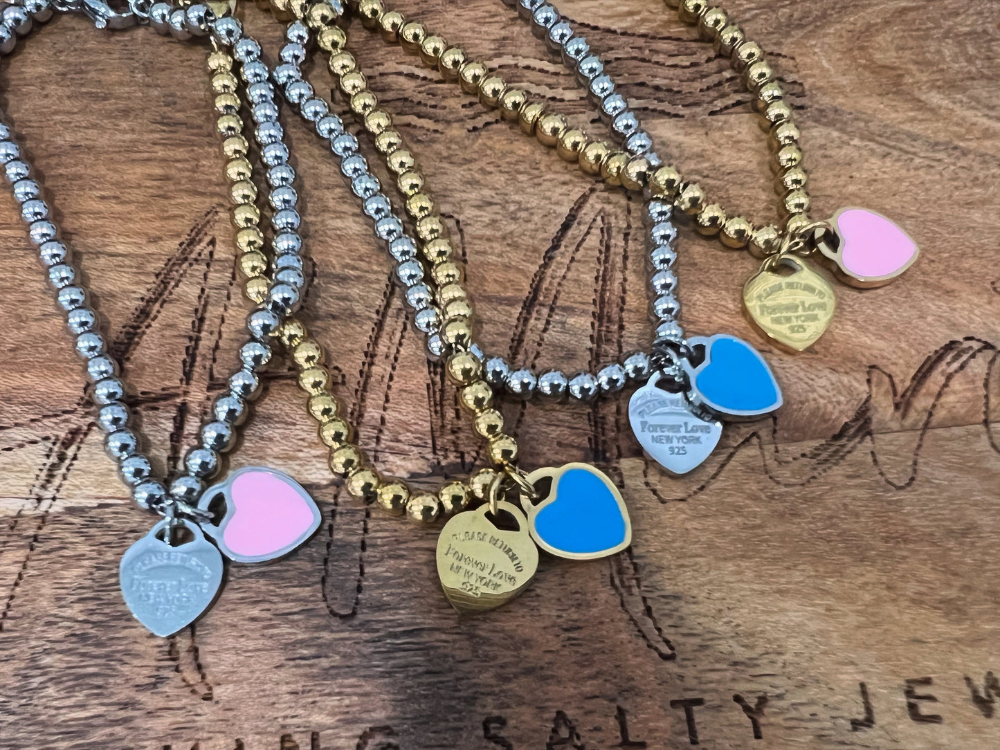 Designer inspired stainless steel beed bracelet with double hearts pendant