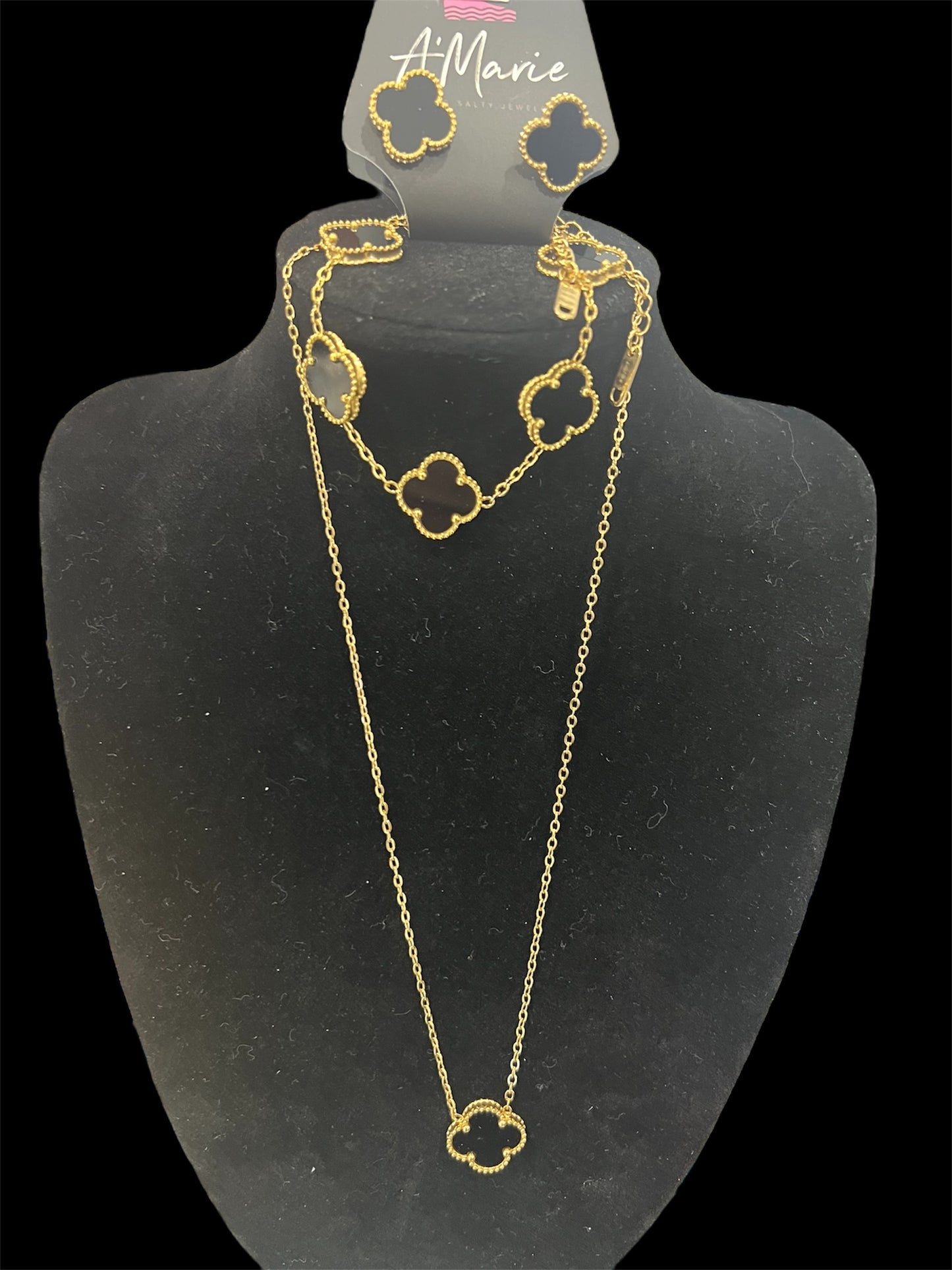 Black and gold four leaf clover set
