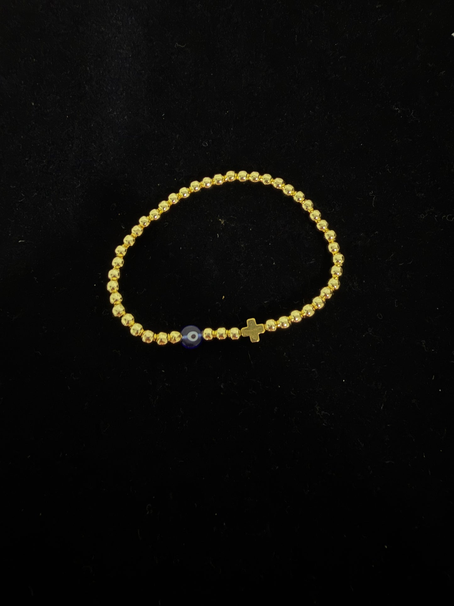 White eye or blue and cross gold plated beaded bracelet